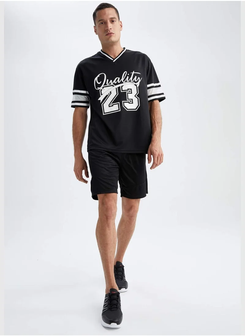 ديفاكتو Man Oversize Fit T-Shirt