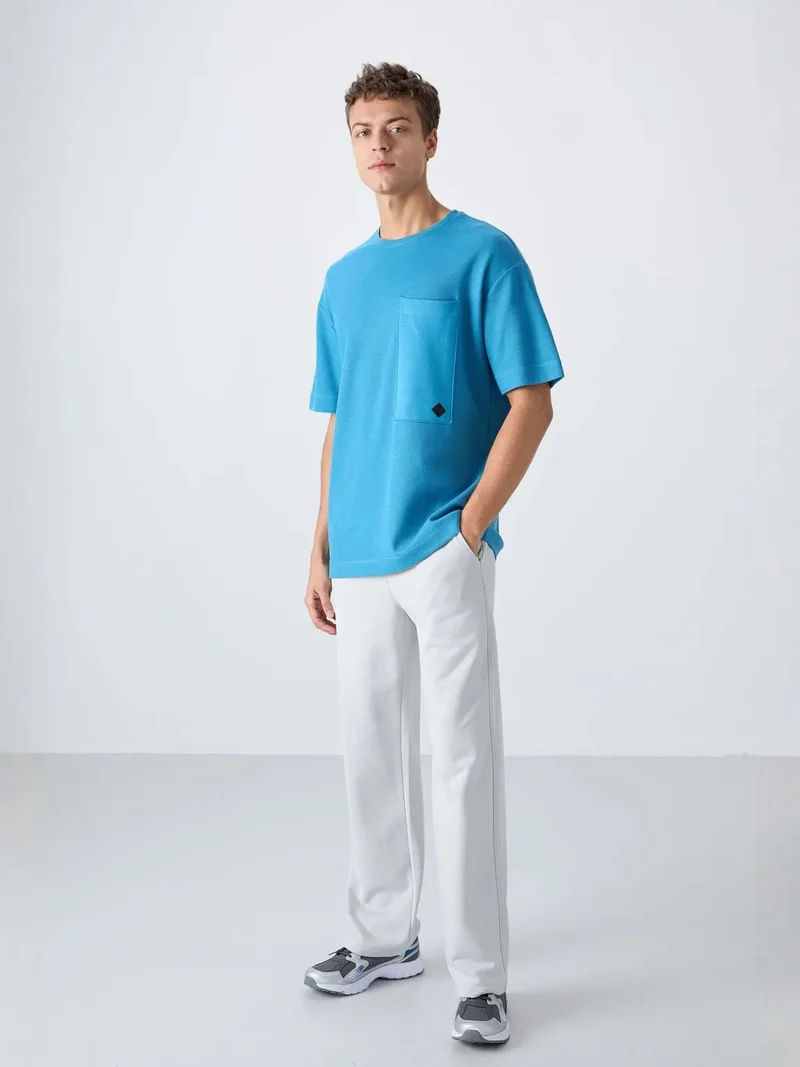 تومي لايف TOMMY Oversized Cotton-Blend Crew Neck T-Shirt With Pocket