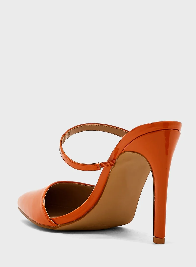Ginger Strap Patent Pump