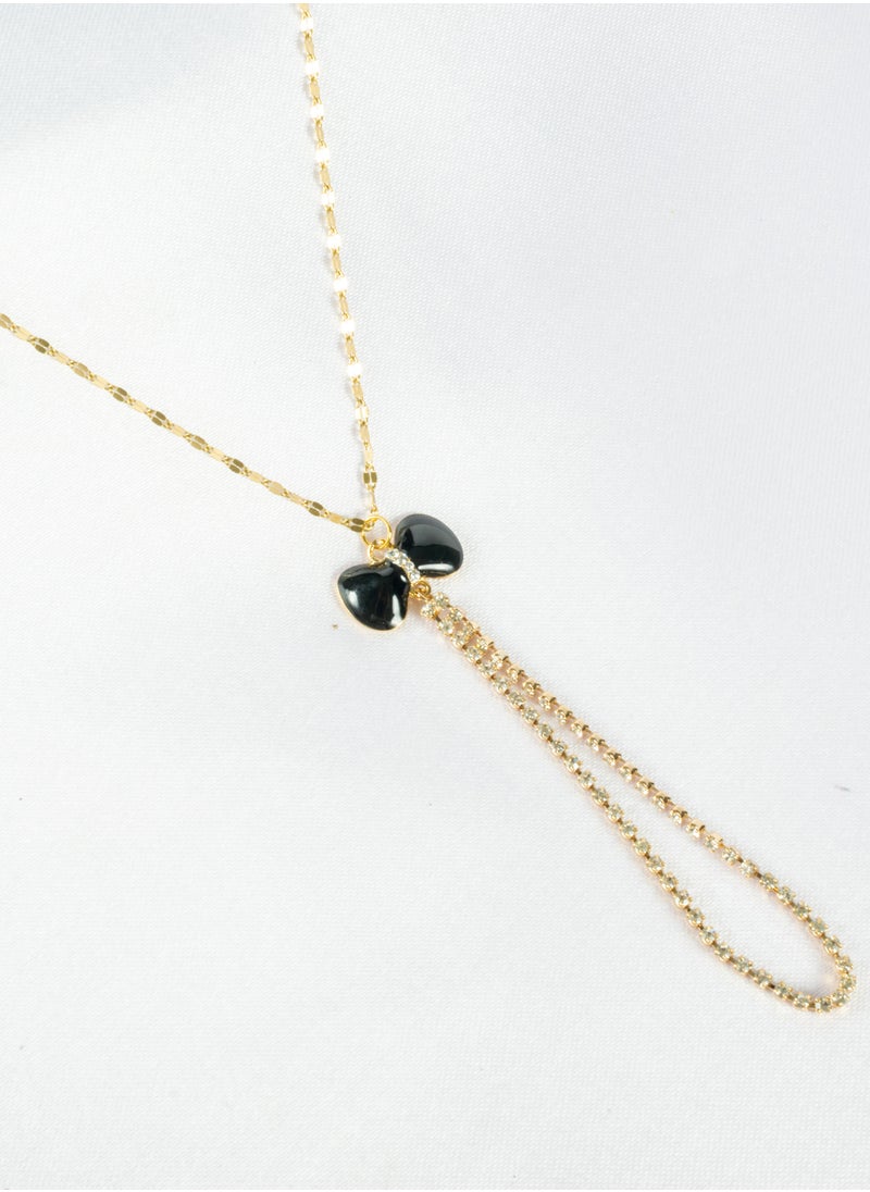 The Black Pearl Accessories - Stainless Steel Necklace Gold with a Black Zirconic Bowtie Pendant - Image 1