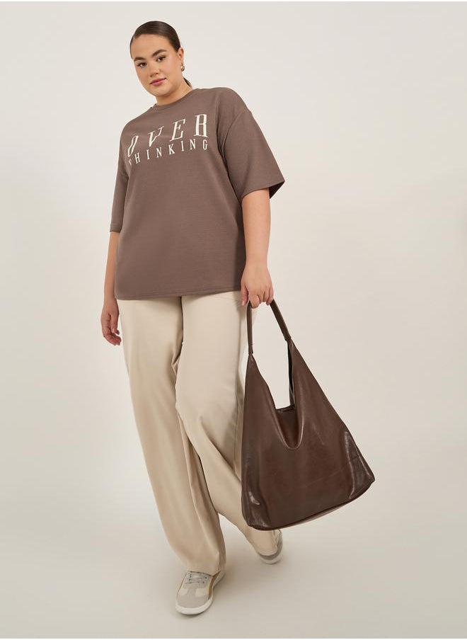 Styli Plus Size Slogan Print Dropped Shoulder Oversized T-Shirt  - Image 2