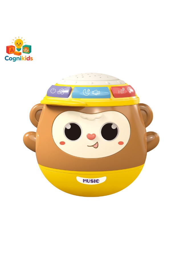 COGNIKIDS لعبة قرد موسيقي مت tumbler 5 في 1 للأطفال – طبل صوت وضوء، عرض نجوم، موسيقى مهدئة، عيون تهتز وميدي | لعبة للأطفال 6 أشهر فما فوق | خالية من BPA | جرس أطفال ممتع مع أضواء 1 قطعة - Image 2