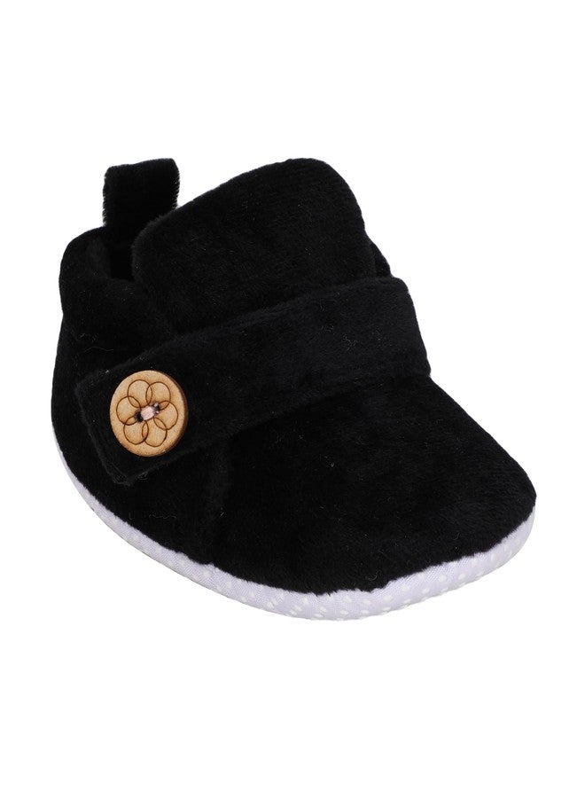 PureSole Classic & Elegant Look Baby Booties for Boys & Girls - Soft Black Velvet Crib Shoes with Wooden Button - Non-Slip Infant First Walkers (6-12 Months) PLAIN BLACK - Image 1