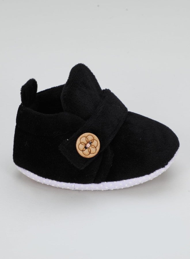 PureSole Classic & Elegant Look Baby Booties for Boys & Girls - Soft Black Velvet Crib Shoes with Wooden Button - Non-Slip Infant First Walkers (6-12 Months) PLAIN BLACK - Image 2