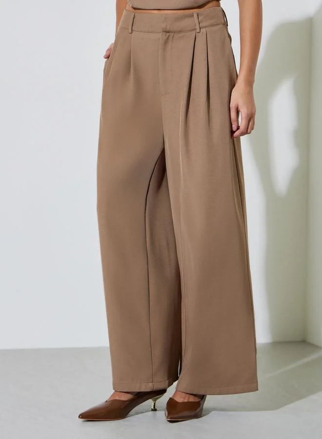 ستايلي Brown Solid Pleated Wide Leg Pants