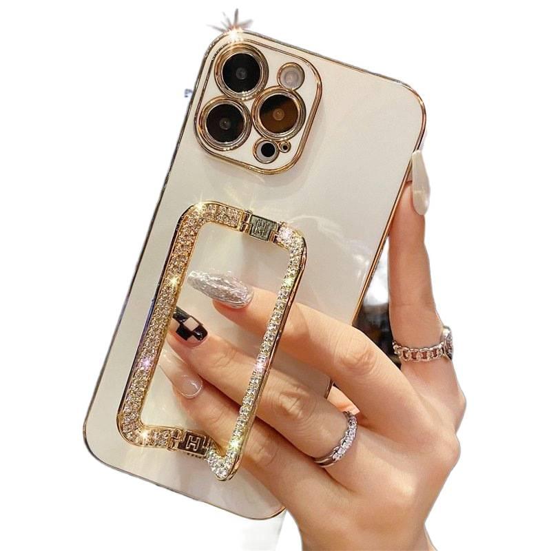 BB غطاء واقي بTPU لـ iPhone 14 / 14 Plus / 14 Pro / 14 Pro Max مع حماية من السقوط وحامل قائم مع مقاوم للصدمات مع طلاء كهربائي مع حامل قائم بإبزيم ماسي باللون أبيض بوظيفة حامل من مادة. - Image 1
