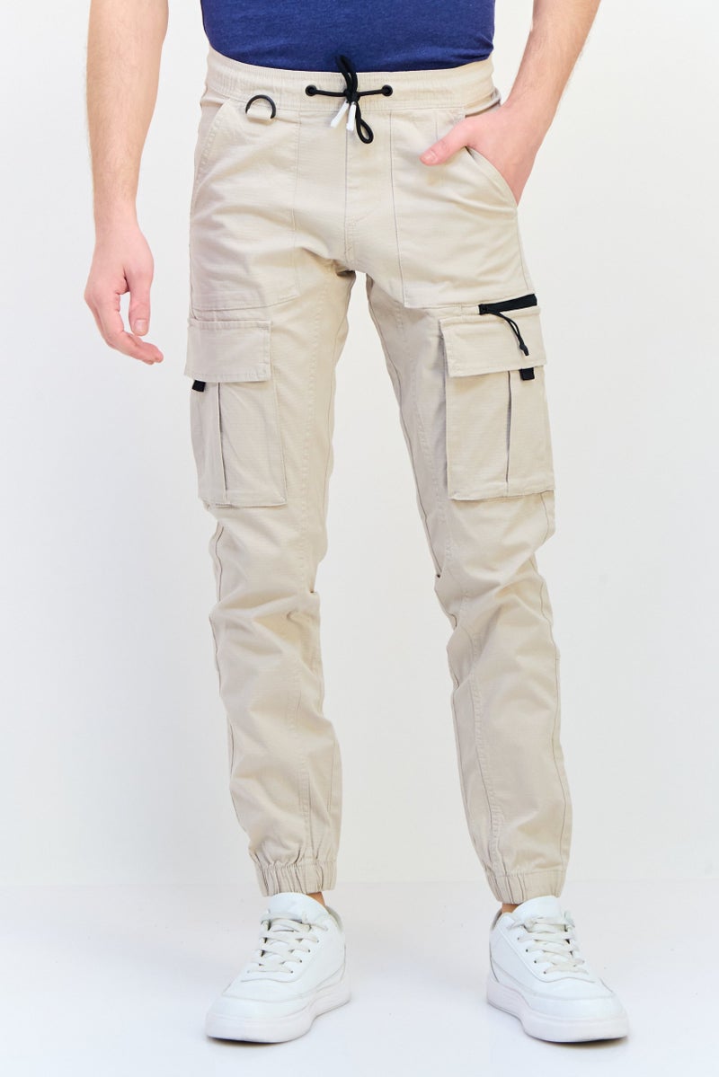 Celio Men Regular Fit Plain Jogger Pants,Beige - Image 1