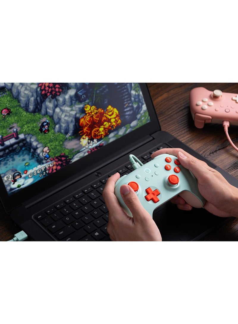8بت دو يد تحكم 8Bitdo Ultimate 2C السلكية لأجهزة الكمبيوتر بنظام ويندوز وأجهزة أندرويد، بمعدل تحديث 1000 هرتز (1000Hz Polling Rate)، مزودة بعصا تحكم ومشغلات (Triggers) بتقنية Hall Effect، وأزرار كتف قابلة لإعادة التعيين (L4/R4). اللون: نعناعي (Mint). - Image 5