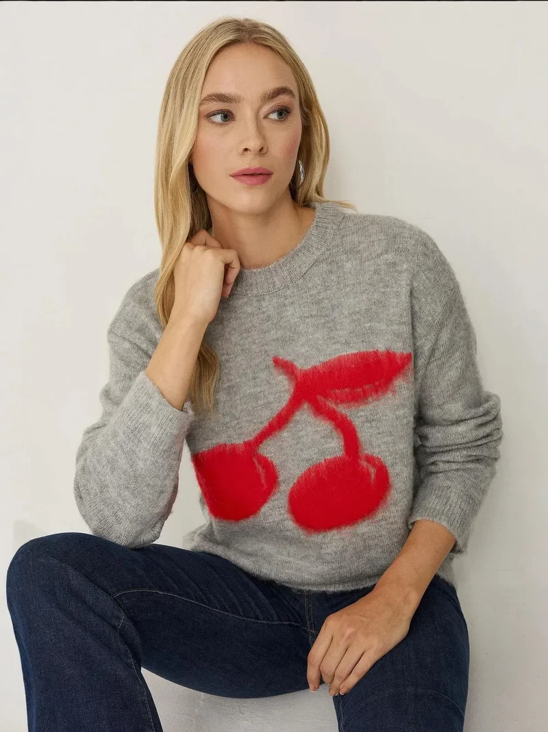 زوبعة كنزة بخصر مريح وتفاصيل كرز