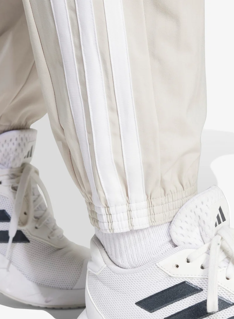 Adidas Beige / White Workout Essentials 3-Stripes Woven Pants for Women | Best Price UAE