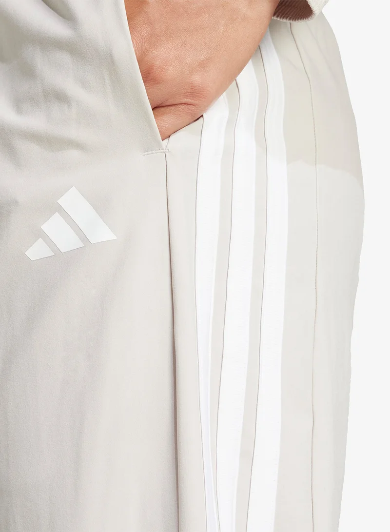 Adidas Beige / White Workout Essentials 3-Stripes Woven Pants for Women | Best Price UAE