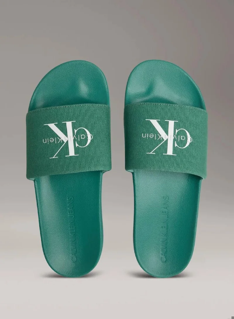 Calvin Klein Jeans Wild Green Canvas Logo Sliders for Men | Best Price UAE