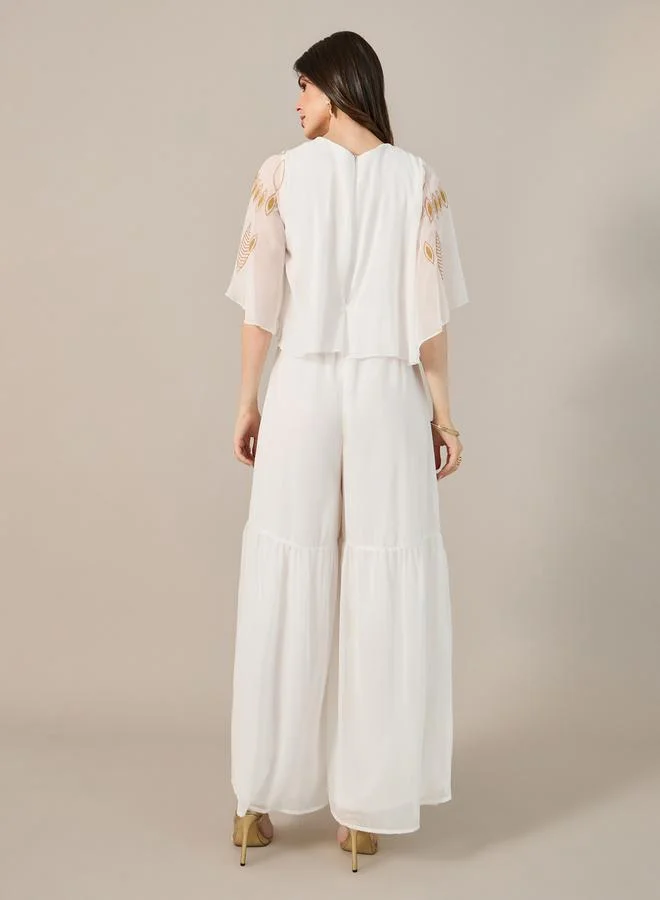 Styli Styli Embroidered V-Neck Angel Sleeve Wide Leg Jumpsuit