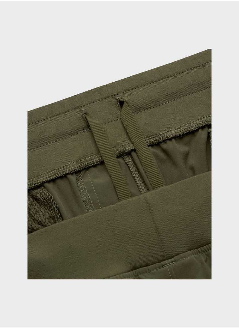 UNDER ARMOUR - Stretch Woven Cargo Pants - Image 1