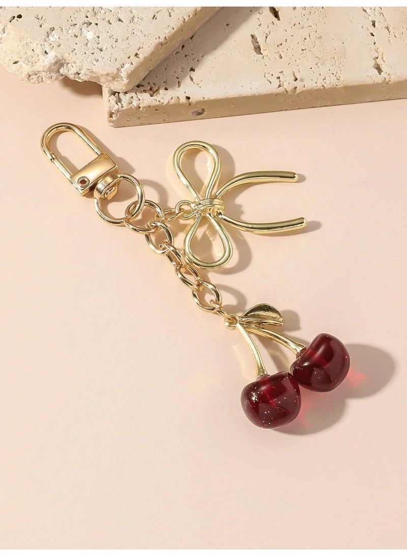 Keychain with Red Cherry Design and Gold Bow – Elegant Accessory for Bags and Keys - Image 1