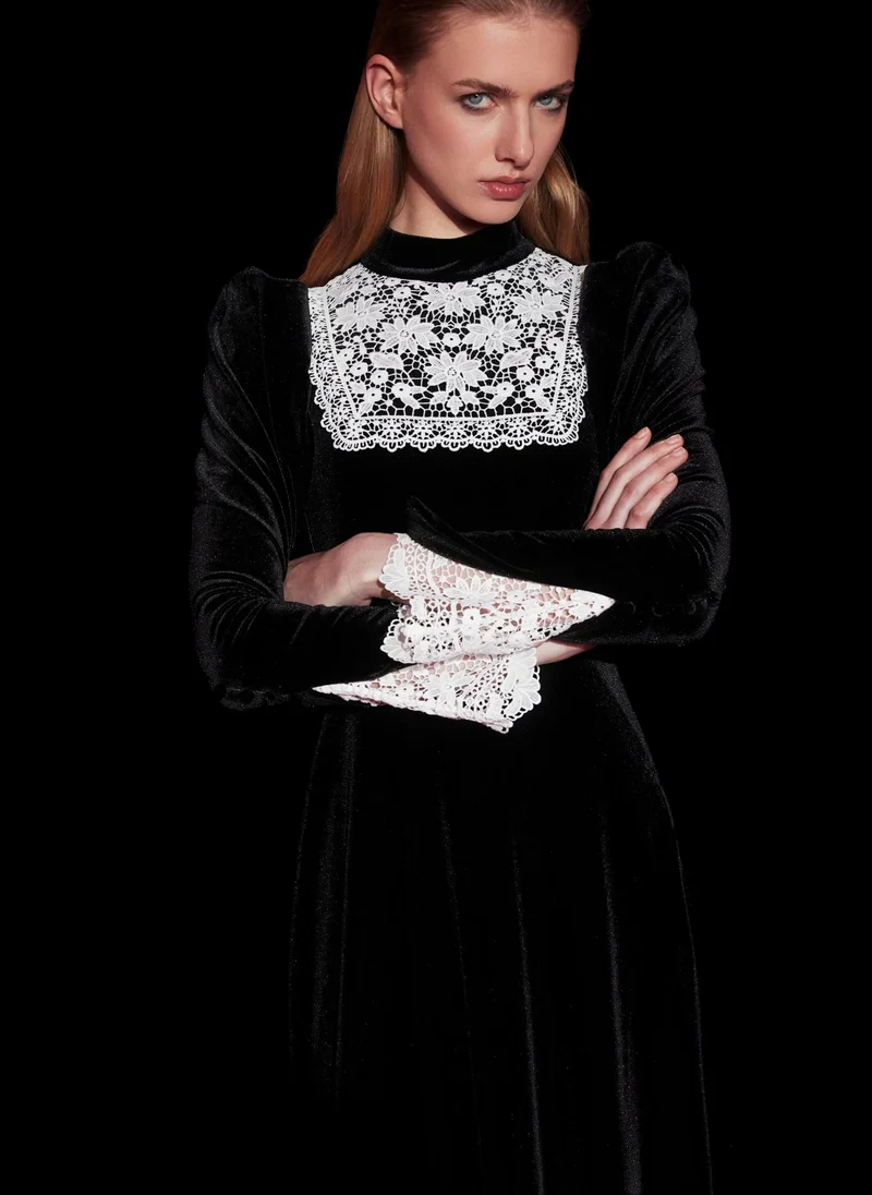 Velvet midi dress with contrasting openwork inserts