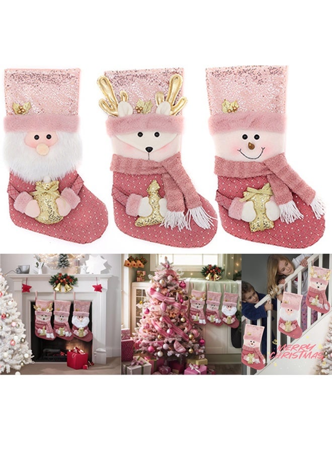 تابيت جوارب عيد الميلاد الوردية (3 قطع) مع بريق ذهبي، مقاس 16 بوصة، كبيرة الحجم، بتصميم ثلاثي الأبعاد على شكل بابا نويل/رجل ثلج/غزال، مناسبة كزينة عائلية لعيد الميلاد، مناسبة للسلالم، أو ديكورات المدفأة المعلقة - Image 1