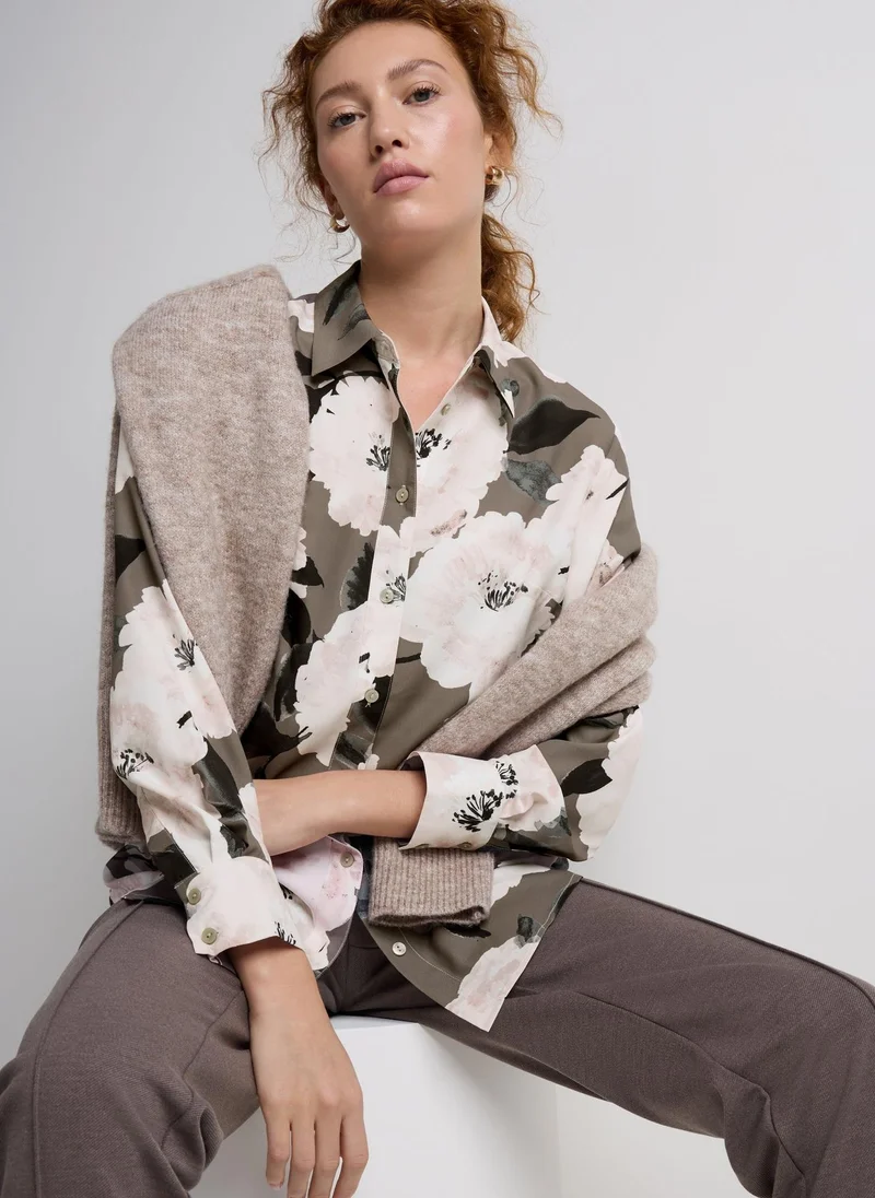 ماتلان بلوزة طويلة بنقشة زهور بلون بيج