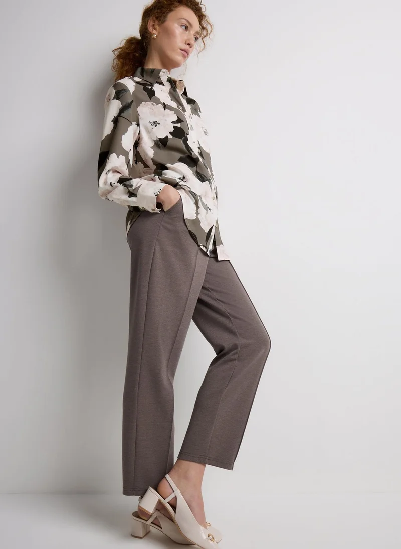 ماتلان بلوزة طويلة بنقشة زهور بلون بيج