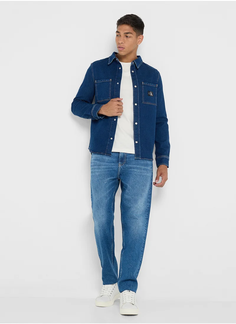 كالفن كلاين جينز Mid Wash Regular Taper Jeans