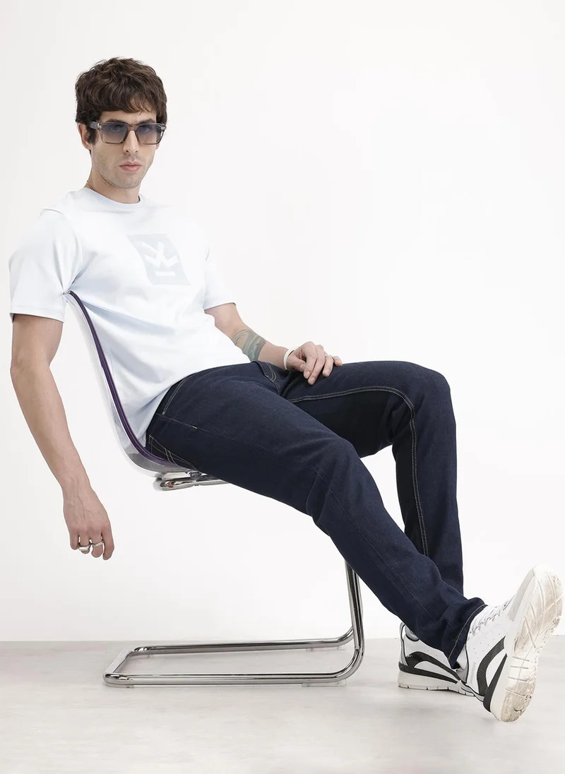 روجن Slim Tapered Washed Denim Jeans | Dark Blue
