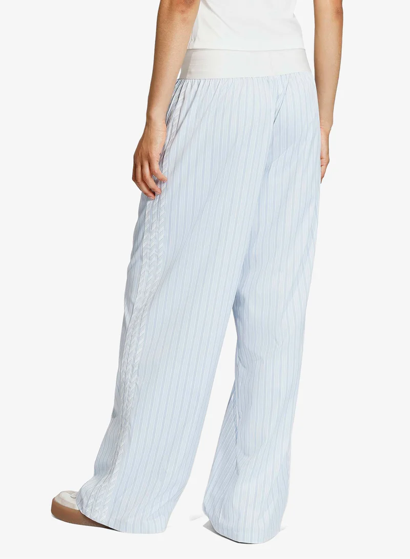 اديداس اوريجينالز بنطلون كتان فضفاض