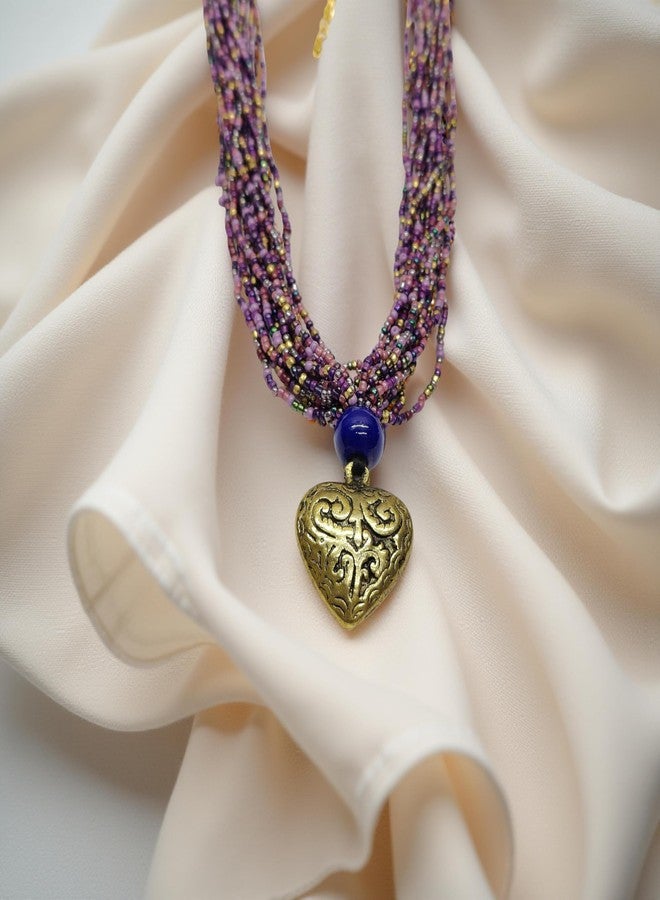 دي سي أيه قلادة DCA متعددة الخيوط من الخرز الزجاجي الأرجواني مع قلادة على شكل قلب ذهبي عتيق، وخرزة زرقاء مميزة - Image 3