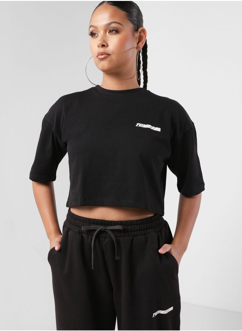 The Giving Movement - Boxy Racer Printed Cropped T-Shirt - Image 1