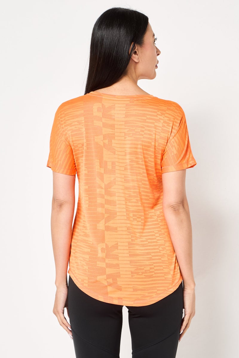 Nike Women Standard Fit Short Sleeve Training Top, Orange - Image 4
