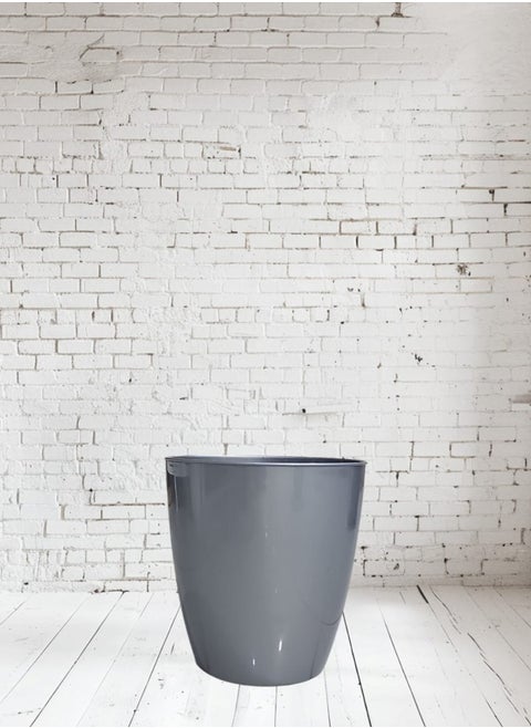 A circular plastic tree stand with an elegant design