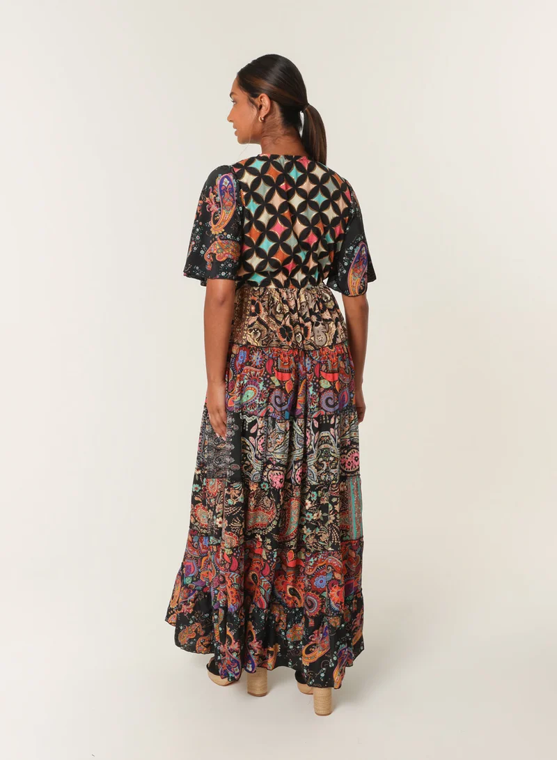 بلو فانيلا فستان ماكسي بأكمام ملاك وأزرار أمامية