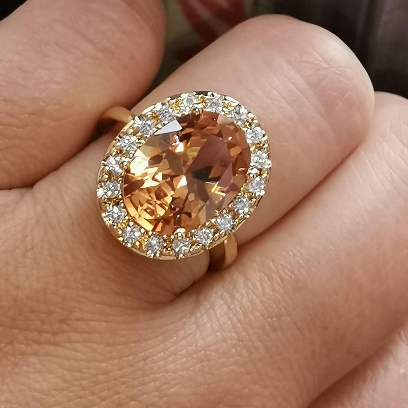 guidecun Golden Tone Oval Shaped Champagne CZ & Round Clear Cubic Zirconia Halo Cocktails Engagement Ring for Woman (US Size 7) - Image 1