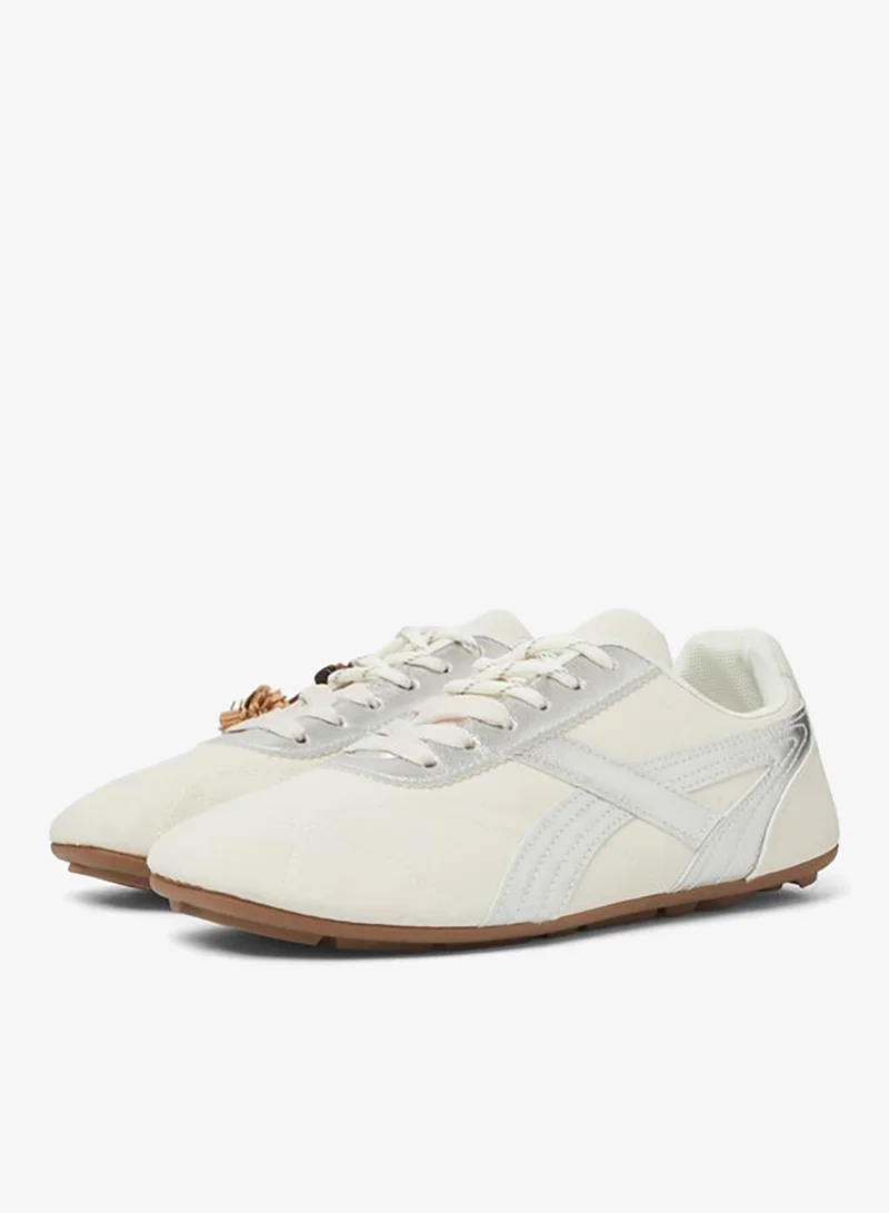 Styli White Lace-Up Retro Sneakers with Pom-Pom Charm