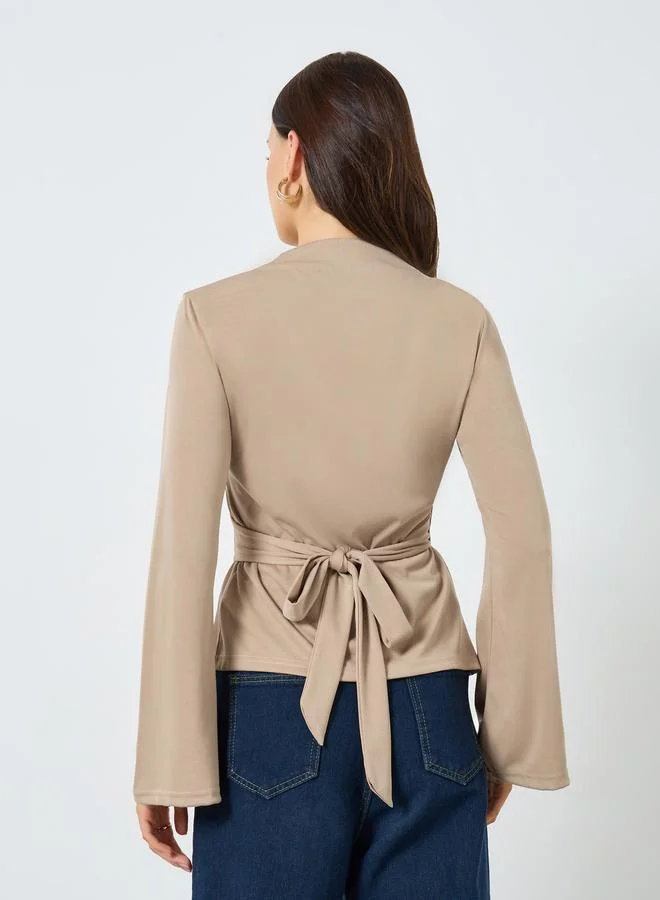 Styli beige Beige Solid Bell Sleeve Wrap Top for Women | Best Price UAE