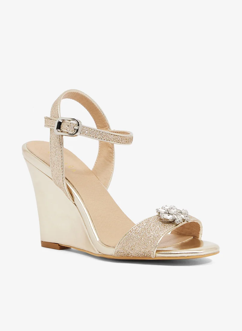 Khizana Gold wedge sandal with glitter straps and crystal brooch