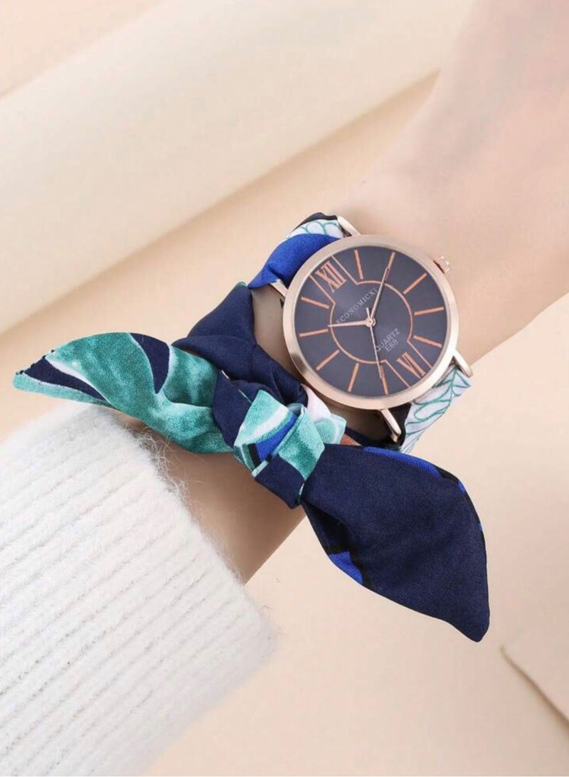 ECONOMICXI Casual Watch For Women With Colored Fabric Strap - Image 1