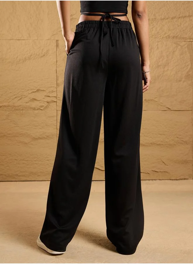 SASSAFRAS Tie-Up Waistband Comfort Fit Pants by Styli