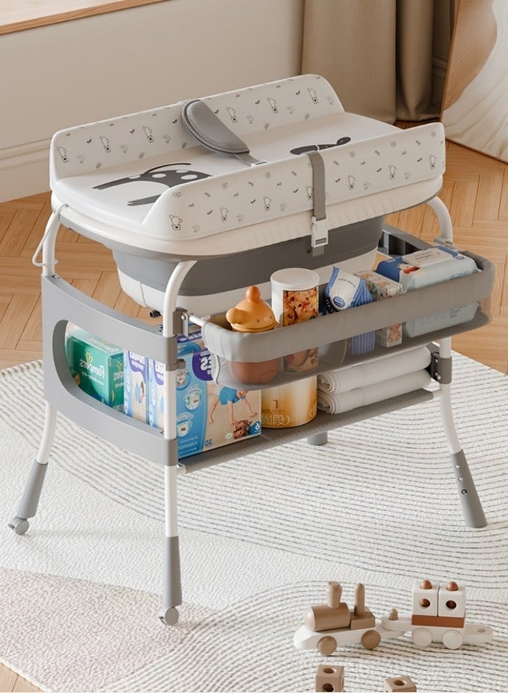 والالا حوض استحمام وطاولة تغيير حفاضات للأطفال 2 في 1، ارتفاع قابل للتعديل، محطة حفاضات قابلة للطي، وسادة مقاومة للماء مع رف تخزين وعجلات، حوض استحمام للأطفال مع شاشة عرض مقياس حرارة - Image 1