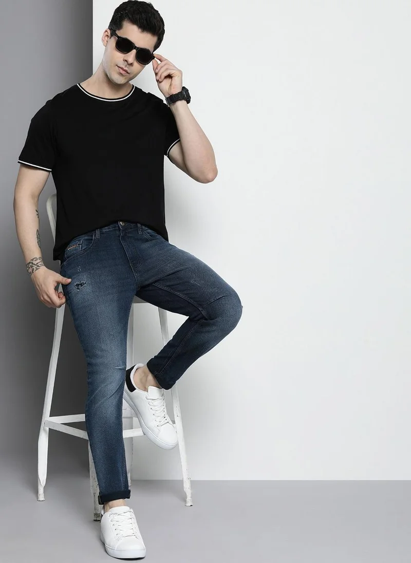 The Indian Garage Co  Men Carrot Fit Solid Mid-Rise Stretchable Jeans for Men | Best Price UAE