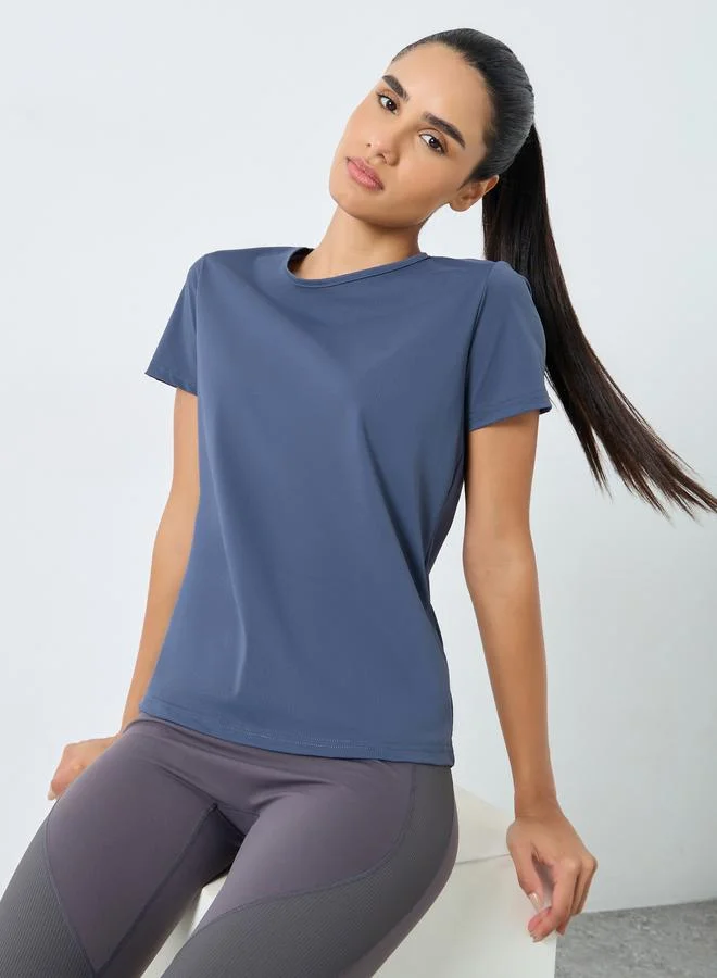 Styli Active Back Teardrop Peep Textured Top