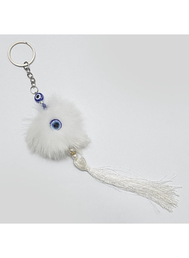 White fur keychain with blue glass eye pendant for keys 
