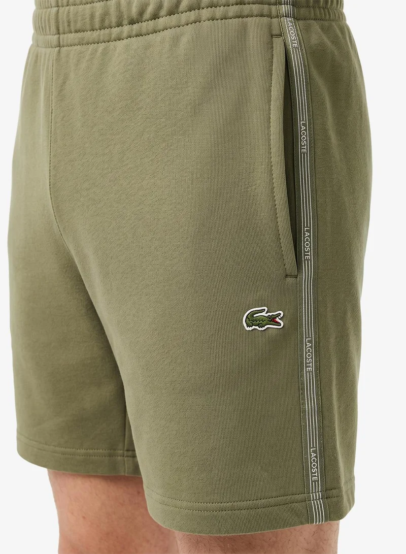 Lacoste  Striped Band Fleece Shorts for Men | Best Price UAE