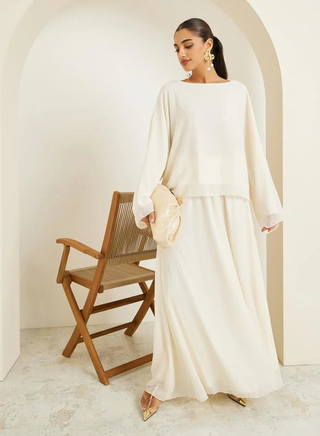 ستايلي طقم منسق من تنورة طويلة وبلوزة شيفون بأكمام طويلة