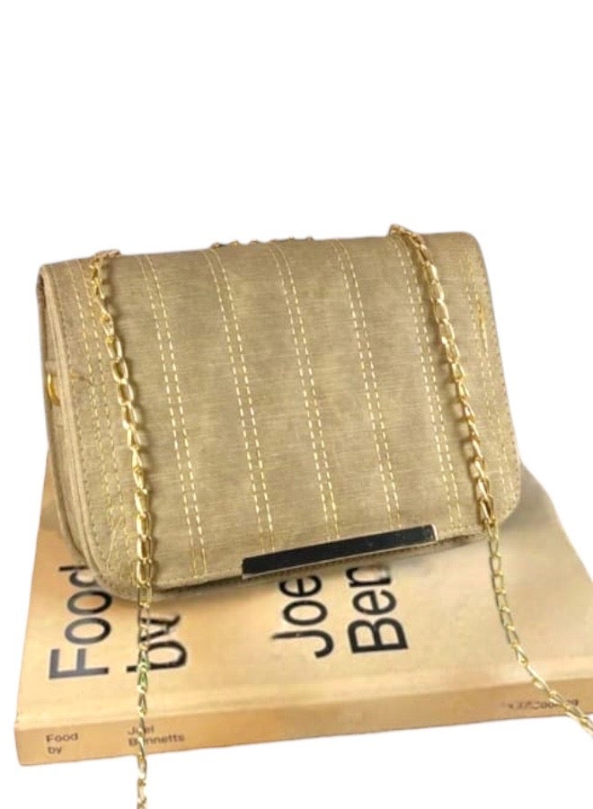 A beige imported leather crossbody bag with elegant details and practical compartments. - Image 1