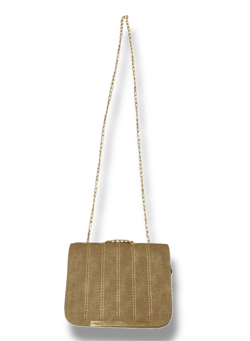 A beige imported leather crossbody bag with elegant details and practical compartments. - Image 2