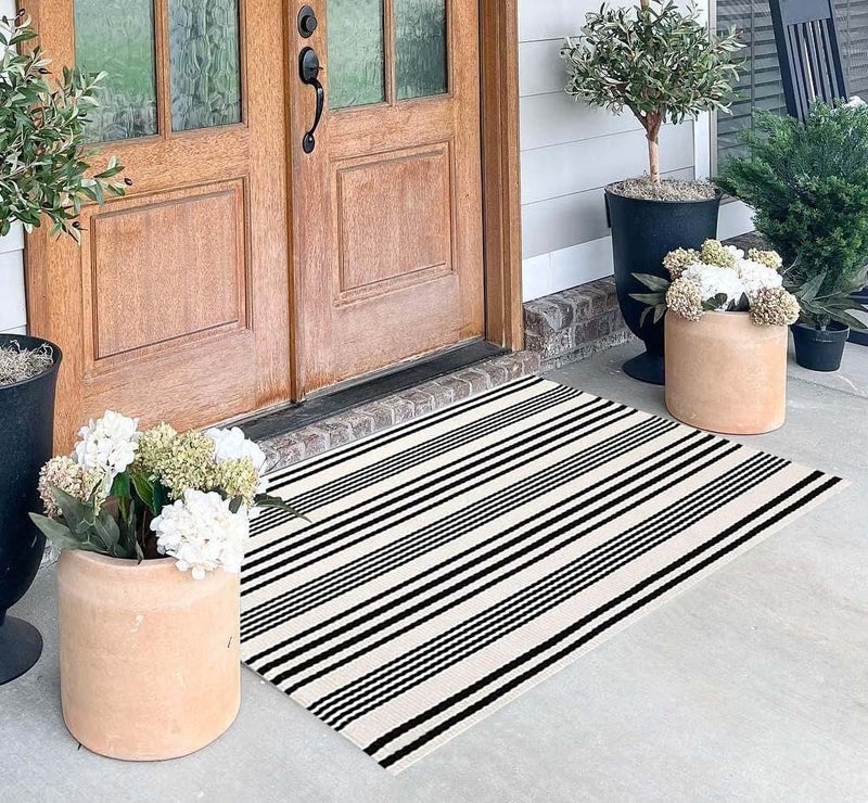 BUAGETUP Black and White Layered Doormat,27.5x43.3inch Striped Outdoor Rug Hand Woven Cotton Indoor Outdoor Rug for Porch Layered - Image 1