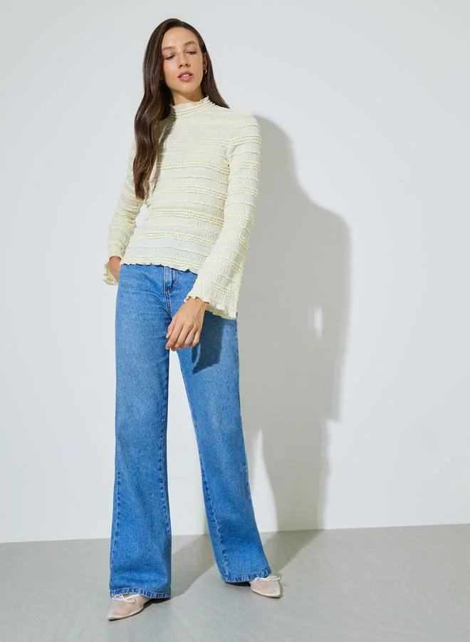 Styli Textured knitted top with high neck & flared sleeves