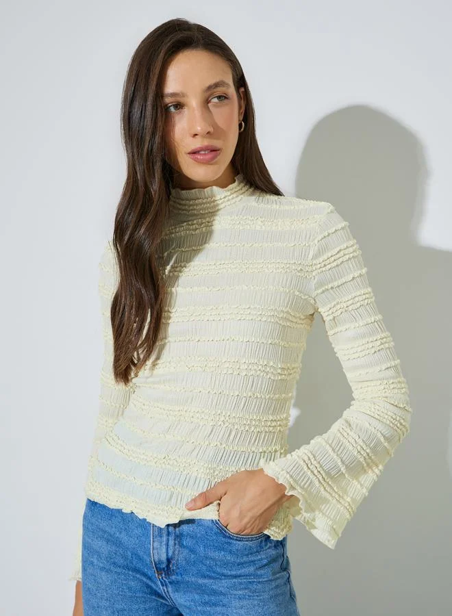 Styli Textured knitted top with high neck & flared sleeves