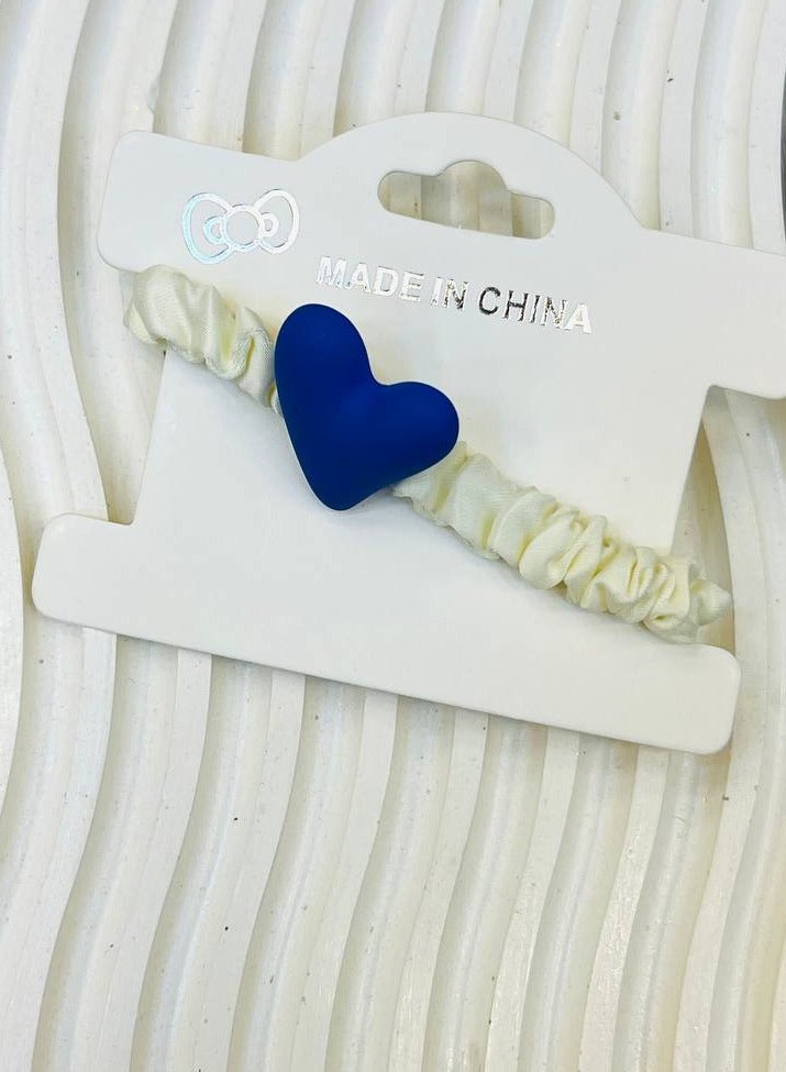 Hair elastic for kids with an elegant heart design in the center — A delicate touch for your little one's beauty!