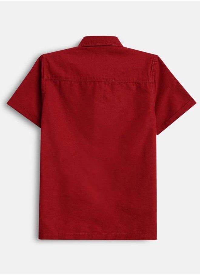 Bonkids - Boy's shirts in regular fit red colour cotton fabric embellished pattern pull over closure woven weave type round collar type round neckline half sleeve length button down upper body wear type suitable for casual occasions – bring home style that tells a story. - Image 1